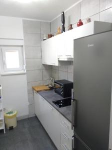 Kuchyň nebo kuchyňský kout v ubytování Apartments by the sea Trogir - 13623