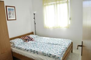 Posteľ alebo postele v izbe v ubytovaní Apartment Vir 13686b