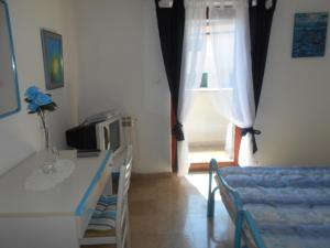 Fotografia z galérie ubytovania Triple Room Rovinj 13591g v Rovinj