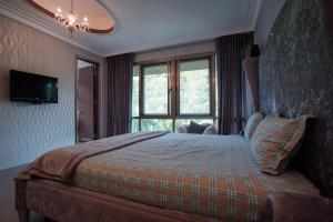 Una cama o camas en una habitación de 小鳥敲門 Bird Villa