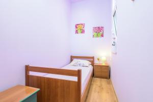 Postel nebo postele na pokoji v ubytování Apartments with WiFi Pula - 14582