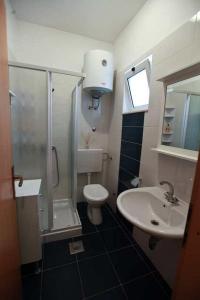Kúpeľňa v ubytovaní Apartment Pakostane 14658a