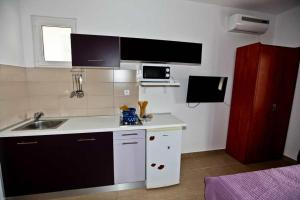 Kuchyň nebo kuchyňský kout v ubytování Apartments by the sea Pakostane, Biograd - 14658
