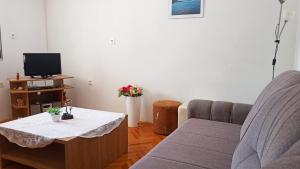 Fotografia z galérie ubytovania Seaside holiday house Vinisce, Trogir - 14704 v destinácii Vinišće