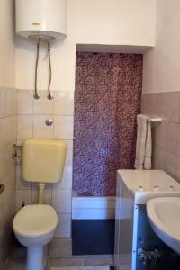 Fotografia z galérie ubytovania Seaside holiday house Vinisce, Trogir - 14704 v destinácii Vinišće