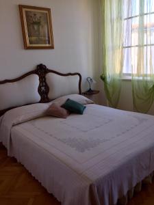 Posteľ alebo postele v izbe v ubytovaní Rooms by the sea Mali Losinj (Losinj) - 14779