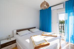 Posteľ alebo postele v izbe v ubytovaní Apartment Bibinje 14773c