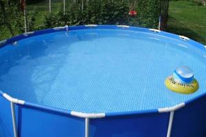 a yellow and blue frisbee sitting on top of a pool at Holiday house with a swimming pool Hreljin, Kraljevica - 14813 in Hreljin