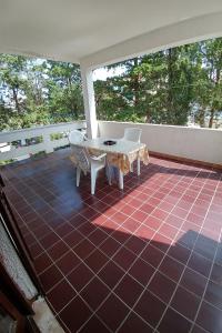Balkón nebo terasa v ubytování Apartment Novalja 13006c