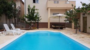 Fotografia z galérie ubytovania Family friendly apartments with a swimming pool Zadar - 14933 v destinácii Zadar