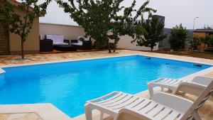 Fotografia z galérie ubytovania Family friendly apartments with a swimming pool Zadar - 14933 v destinácii Zadar
