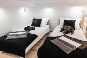 Posteľ alebo postele v izbe v ubytovaní Old Cracow Apartment