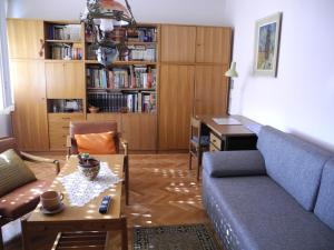 a living room with a couch and a table at Apartments with WiFi Split - 15028 in Split