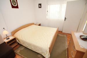 Posteľ alebo postele v izbe v ubytovaní Apartment Trogir 15011c