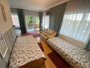 Postel nebo postele na pokoji v ubytování Villa Lux