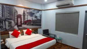 Annandam Inn(Hotel Anand)客房内的一张或多张床位