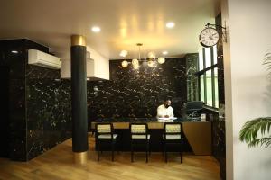 Annandam Inn(Hotel Anand)的休息区