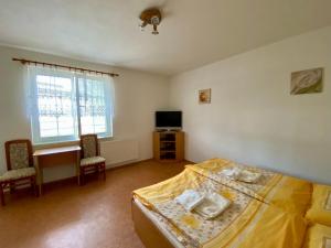 Postel nebo postele na pokoji v ubytování Vila Heda