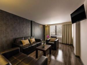 Posezení v ubytování Suites Meson Del Cid