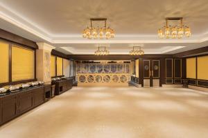 Hotel Hillock Ahmedabad客房内的一张或多张床位