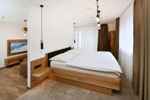 Posteľ alebo postele v izbe v ubytovaní APLEND Hotel Ovruč