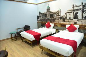 Annandam Inn(Hotel Anand)客房内的一张或多张床位