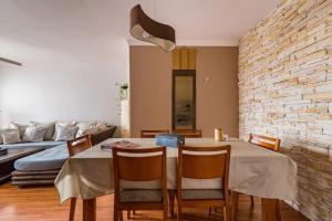 a dining room with a table and chairs at Casa Lucy in Las Palmas de Gran Canaria