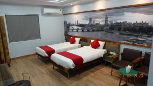 Annandam Inn(Hotel Anand)客房内的一张或多张床位