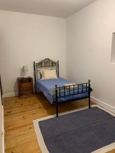 Cama ou camas em um quarto em Quinta Viela Principal