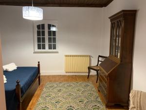 Cama ou camas em um quarto em Quinta Viela Principal