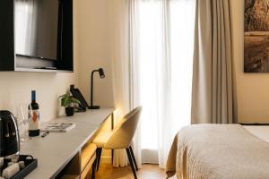 Posteľ alebo postele v izbe v ubytovaní Boutique Hotel Petit Montisión