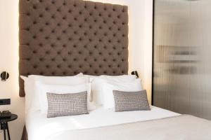 Posteľ alebo postele v izbe v ubytovaní Boutique Hotel Petit Montisión
