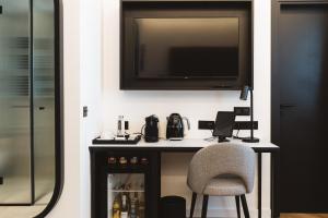 Príslušenstvo na prípravu kávy alebo čaju v ubytovaní Boutique Hotel Petit Montisión