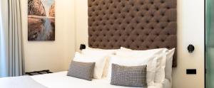 Posteľ alebo postele v izbe v ubytovaní Boutique Hotel Petit Montisión