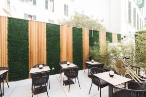 Reštaurácia alebo iné gastronomické zariadenie v ubytovaní Boutique Hotel Petit Montisión