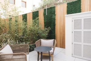 Vonkajšia záhrada v ubytovaní Boutique Hotel Petit Montisión