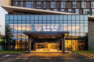佛山敏卓酒店Mentor Hotel的门面或入口
