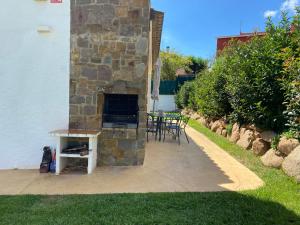 Zahrada ubytování Formentera a la Costa Brava amb BBQ i jardí