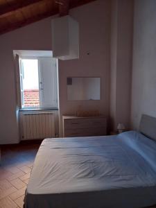 Postel nebo postele na pokoji v ubytování Casa Natale
