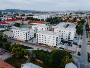 an aerial view of a city with white buildings at Strešný Aparmán Pri Mlyne in Skalica