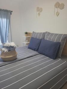 Кровать или кровати в номере Casa de Almano - Torremolinos direct on beach