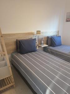 Кровать или кровати в номере Casa de Almano - Torremolinos direct on beach