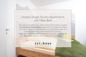Postel nebo postele na pokoji v ubytování Zeighaus Murtal