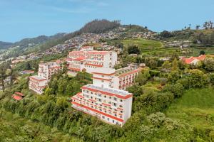 an aerial view of a building on a hill at Sterling Ooty Elk Hill in Ooty