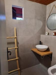 Koupelna v ubytování Apartments Hortenzija