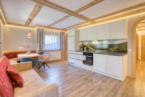 Kuchyň nebo kuchyňský kout v ubytování Appartement Hofmann