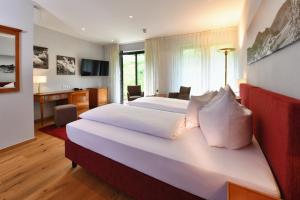 Postel nebo postele na pokoji v ubytování Hotel Rebenhof