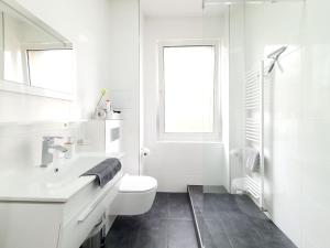 Ένα μπάνιο στο Apartments an der Kreuzstraße +13 φωτογραφίες