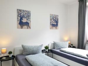 Ένα ή περισσότερα κρεβάτια σε δωμάτιο στο Apartments an der Kreuzstraße