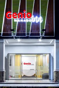 a store front of a generico store with a sign at Genio Inn - MANTOS in Manado